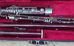 Reynolds Emperor Bassoon Wood Body Lacquered Dark With Case. Fixed Price $2395.00.