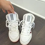 Adidas Women's High Top Athletic Sneakers White Black Red HR1415. Fixed Price $55.00.