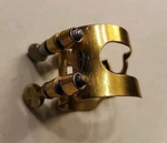 Vintage Harrison Clarinet Ligature Gold. Fixed Price $49.99.