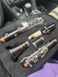 Giardinelli Intermediate Clarinet Grenadilla Wood Silver Plated Keys. Fixed Price $1300.00.
