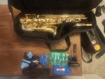 Accent Alto Saxophone: Reeds, Swabs, Gator Case All Included. Fixed Price $550.00.