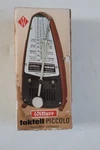 Wittner Taktell Piccolo Keywound Metronome Ruby Red #834. Fixed Price $45.00.