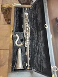 Noblet Paris Bass Clarinet, Wood Body With Case. Fixed Price $750.00.
