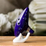 Legend Of Zelda Ocarina Time 12 Hole Alto W/song Book Display Stand. Fixed Price $25.02.